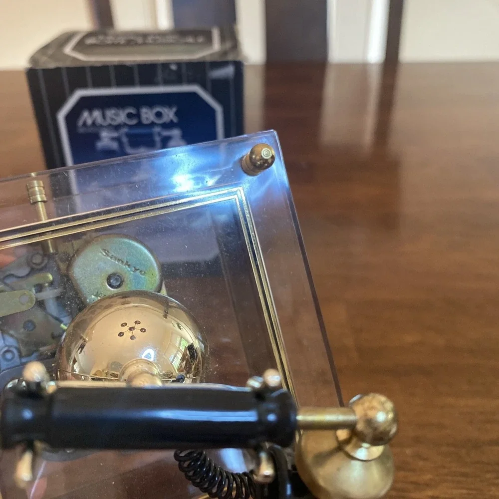 Musical Revolving Telephone With Gold Accents Song (Fillings)
